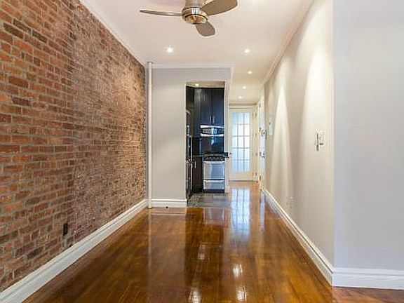2nd image of 118 E 7th St APT 1E