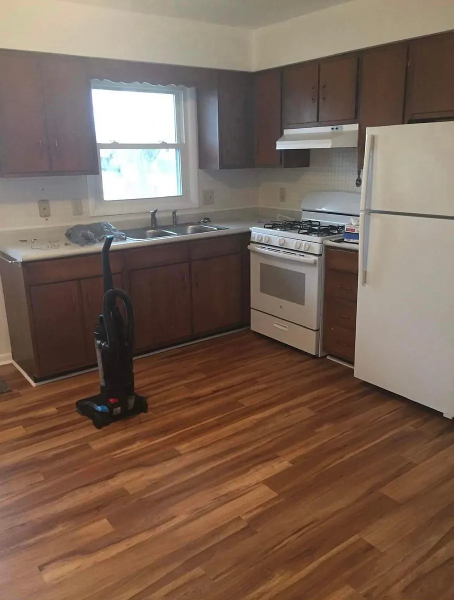 Vinyl Plank Flooring in the kitchen and bathroom. New appliances as of 2020. - 112 W 14th St #112 W 14TH ST