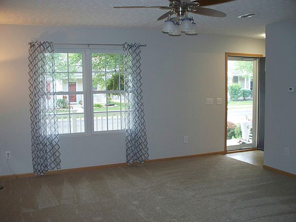 Living Room with Celing Fan & off Foyer