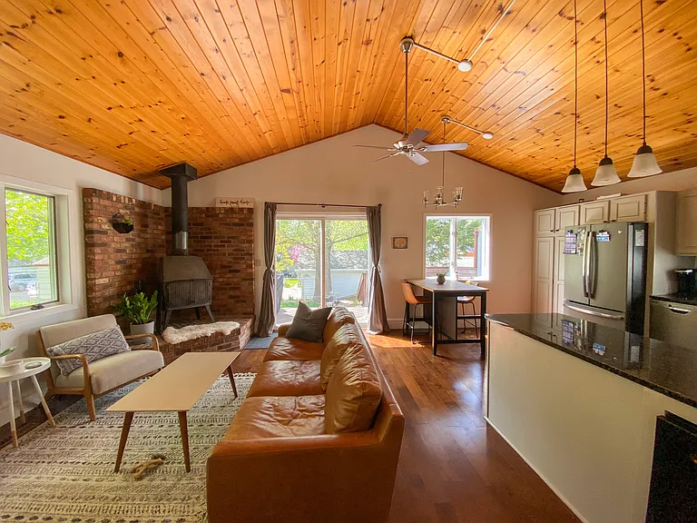 Open concept kitchen, dining and living space