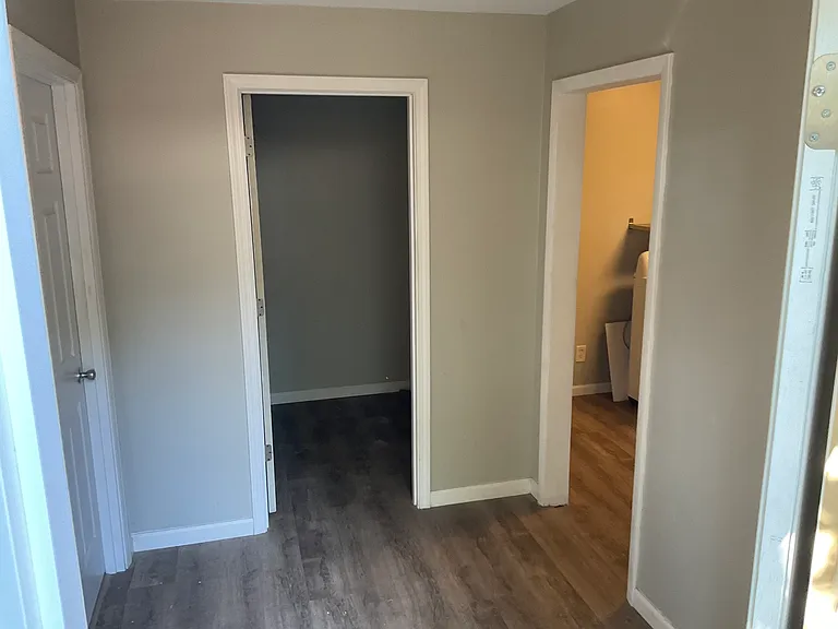 Storage closet at masterbedroom entrance
