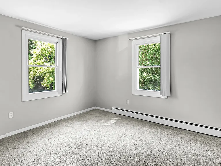Brighten your days in Aspen Chase's sun-kissed bedrooms, where the windows fill your space with warmth and light.