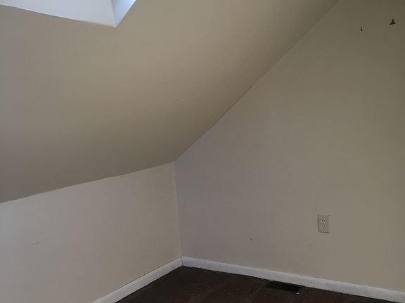 bedroom with skylight