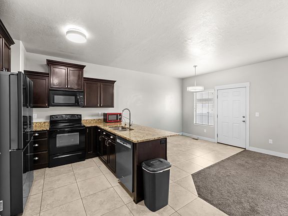 5th image of 1621 N Venetian Way E