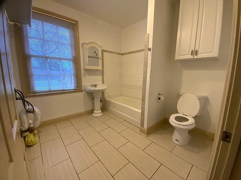 Bathroom.. on left is washing machine & dryer hookups