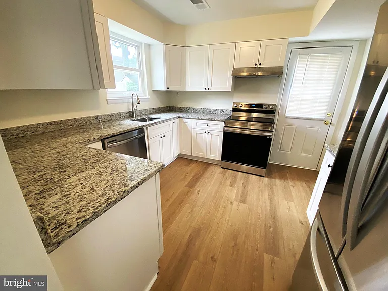 7707 Queens Park Rd — Photo 9