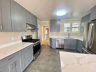 New casement windows and new sink & faucet with pull out nozzle. 
Brand new gas stove - 4 burners with griddle. Brand new Countertops & ceramic tile floors.