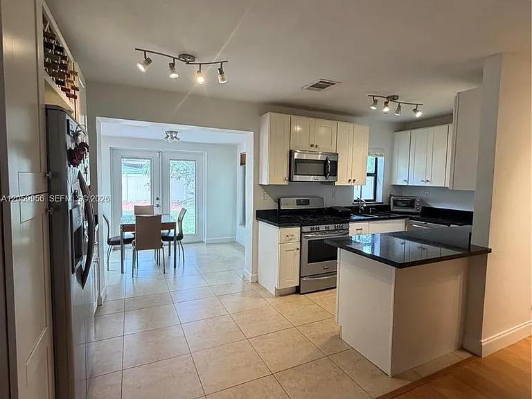 6717 Raleigh St — Photo 1