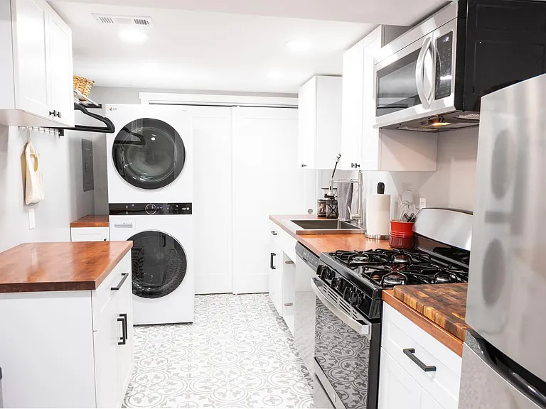 Basement kitchenette and laundry room