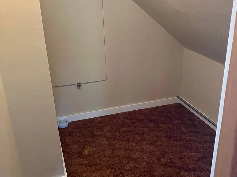 Walk in storage closet in upstairs bedroom