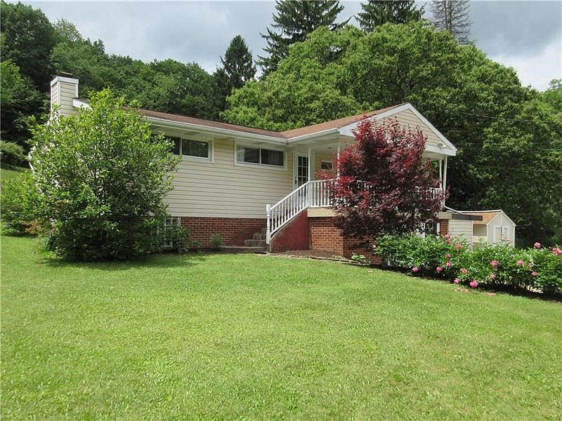 Front of the home features a 19 x 9 ft covered front porch and has been very nicely landscaped!