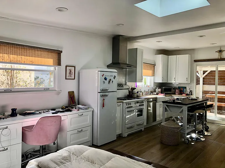 desk, and kitchen area