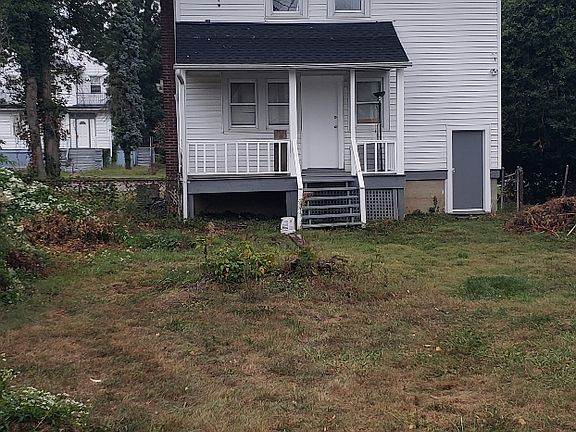 back of house showing fenced yard