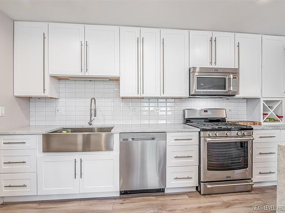5th image of 5601 Carriageway Dr APT 312