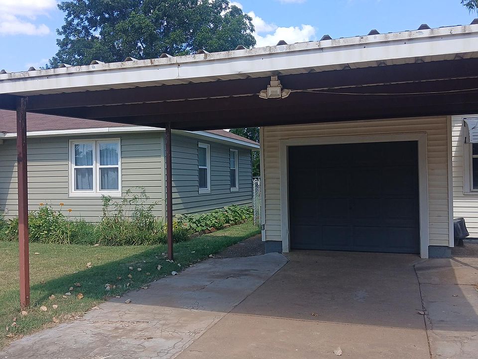 2 carport cover attached to enclosed garage.