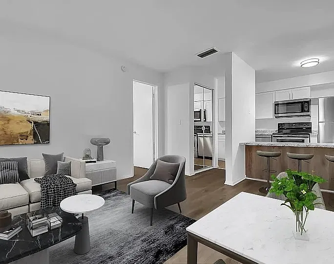 Step into this stylish apartment featuring a modern open-concept layout, elegant finishes, and inviting natural light-your perfect retreat awaits!