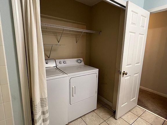 Laundry and storage in second upstairs bathroom.