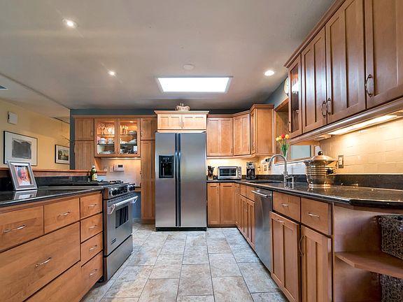 Open kitchen with granite counters