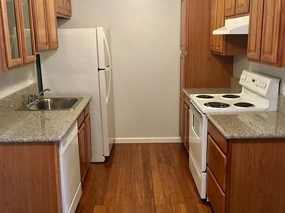 Hardwood floors in kitchen with granite counter tops