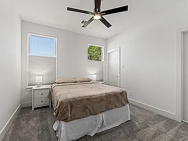 The 2nd bedroom offers a queen bed dressers and a small walk-in closet.