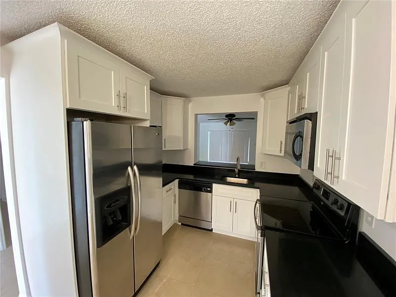 Building Photo - 23466 SW 57th Ave #504