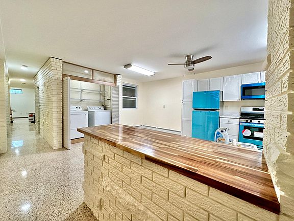 Kitchen, in-unit washer and dryer, butcher block countertop