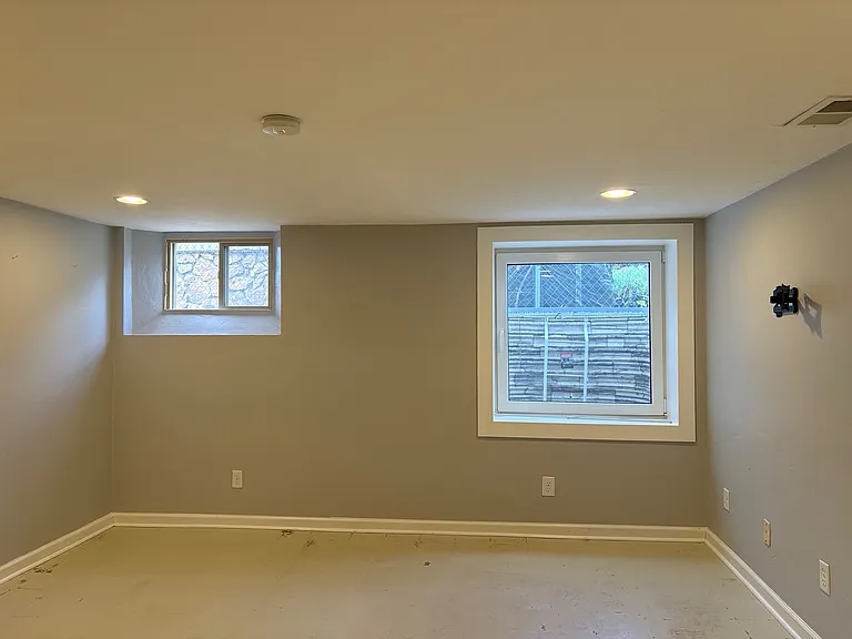 Unfurnished view of third garden-level bedroom