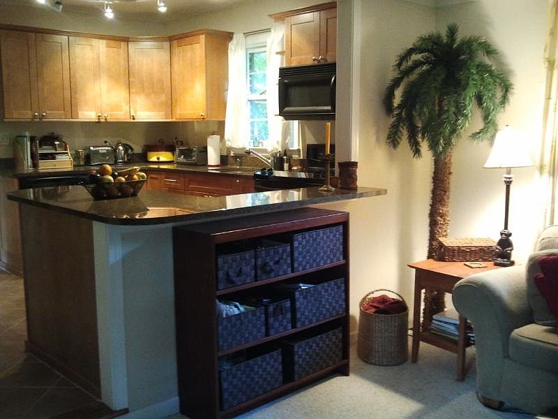 Updated kitchen with granite counters, slate floor and stain
