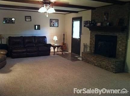 Living Room
						:
						Large living room with wood burning fireplace.
