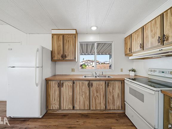 5th image of 11427 E 36th Pl