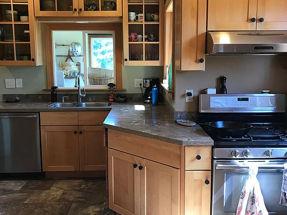 Kitchen with gas stove and dishwasher