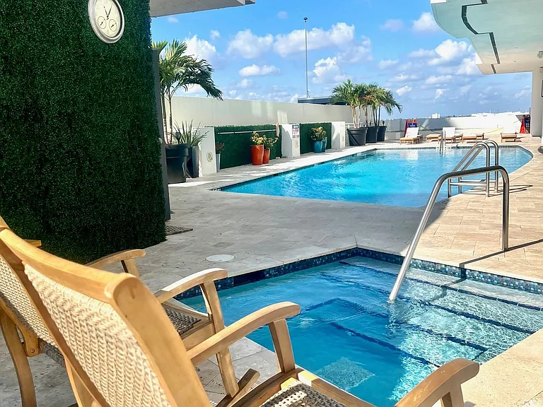 Hot tub for perfect relaxation on 7th floor amenities deck.