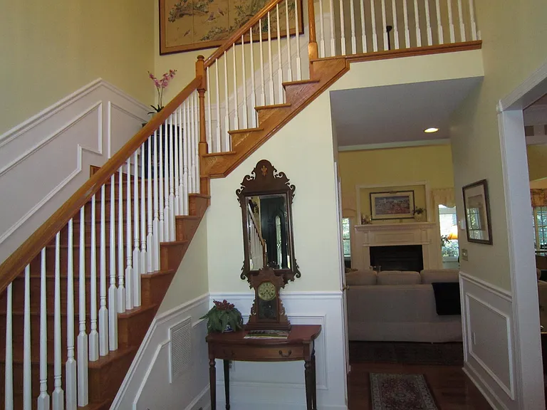 Stairs from Foyer to 2nd Floor with 5 BRs and 3 Baths