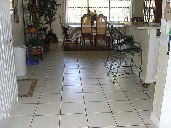 4th image of 8440 59th Ln N