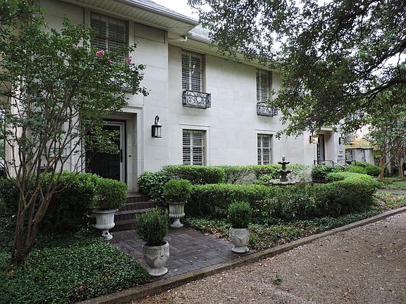 Front of Duplex with Fountain