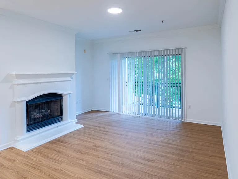 Living Room with Fireplace and Balcony