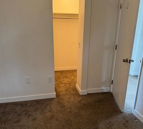 First Bedroom and walk-in closet. Street side.