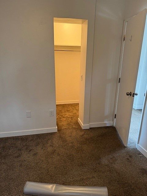 First Bedroom and walk-in closet. Street side.
