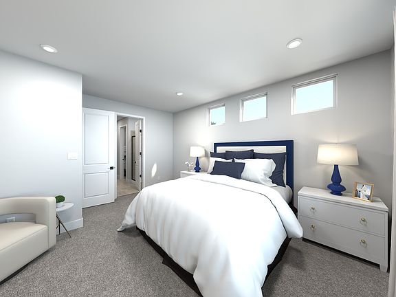 The primary bedroom offers a private retreat.