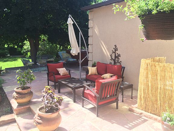 Patio with view and hot tub
