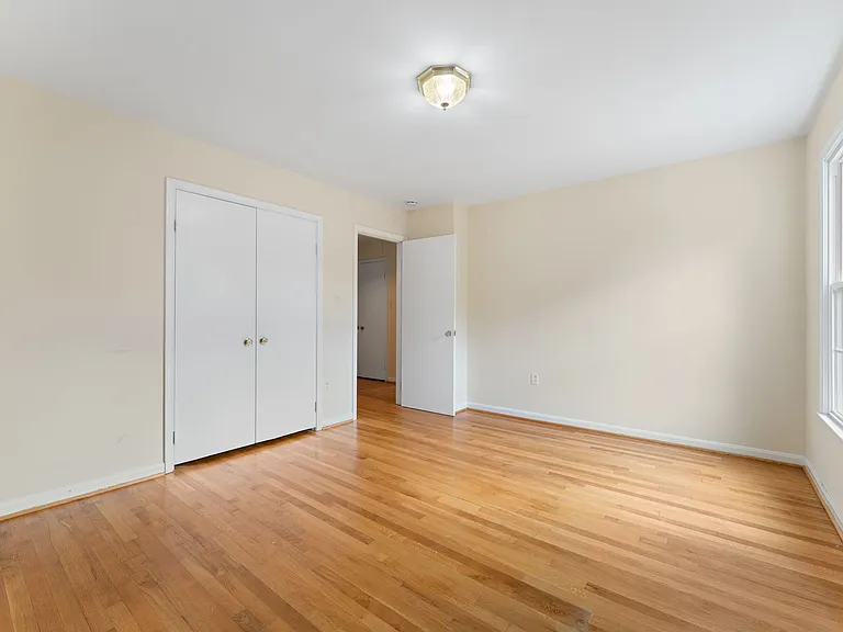 4th bedroom has large closet with built-in shelving