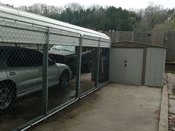 Carport and storage shed