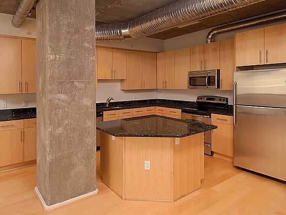 Spacious urban interiors topped off with high-end finishes