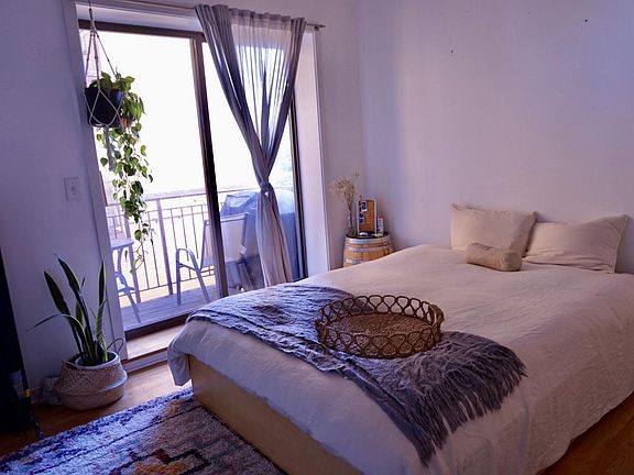 Master bedroom with balcony