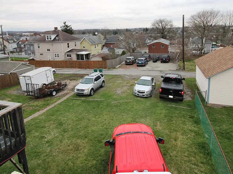 Backyard and off-street parking view from the apartment