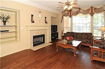 Family room with wood floors.