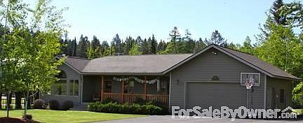 FRONT OF HOME
						:
						Beautiful home with big yard, double garage, storage shed