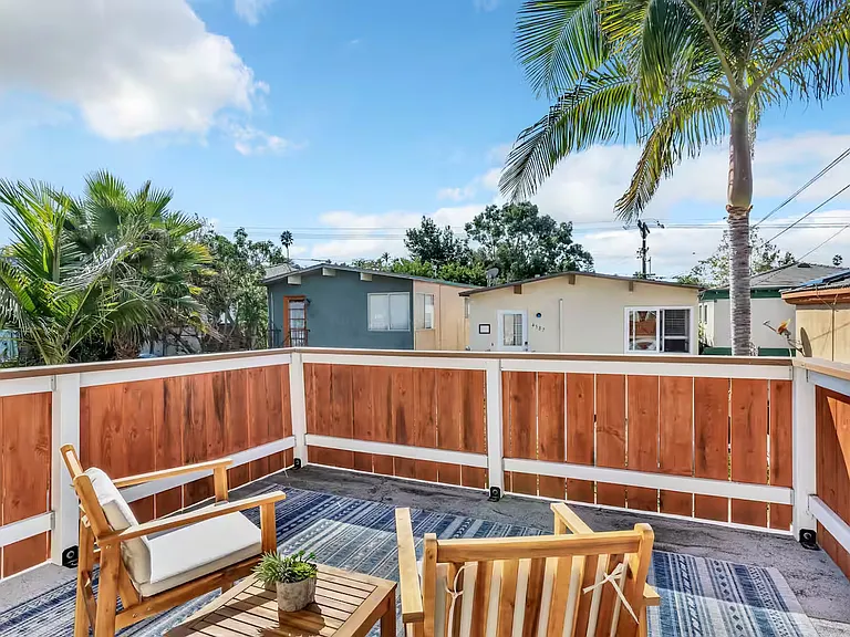 Second-floor terrace with comfortable outdoor seating and fantastic views. The perfect spot to unwind.