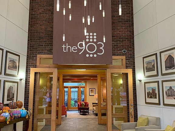 ENTRANCEWAY TO CONDO BUILDING DOORMAN 24/7