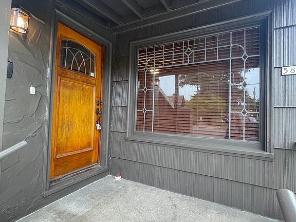 Front porch, with original leaded glass windows.